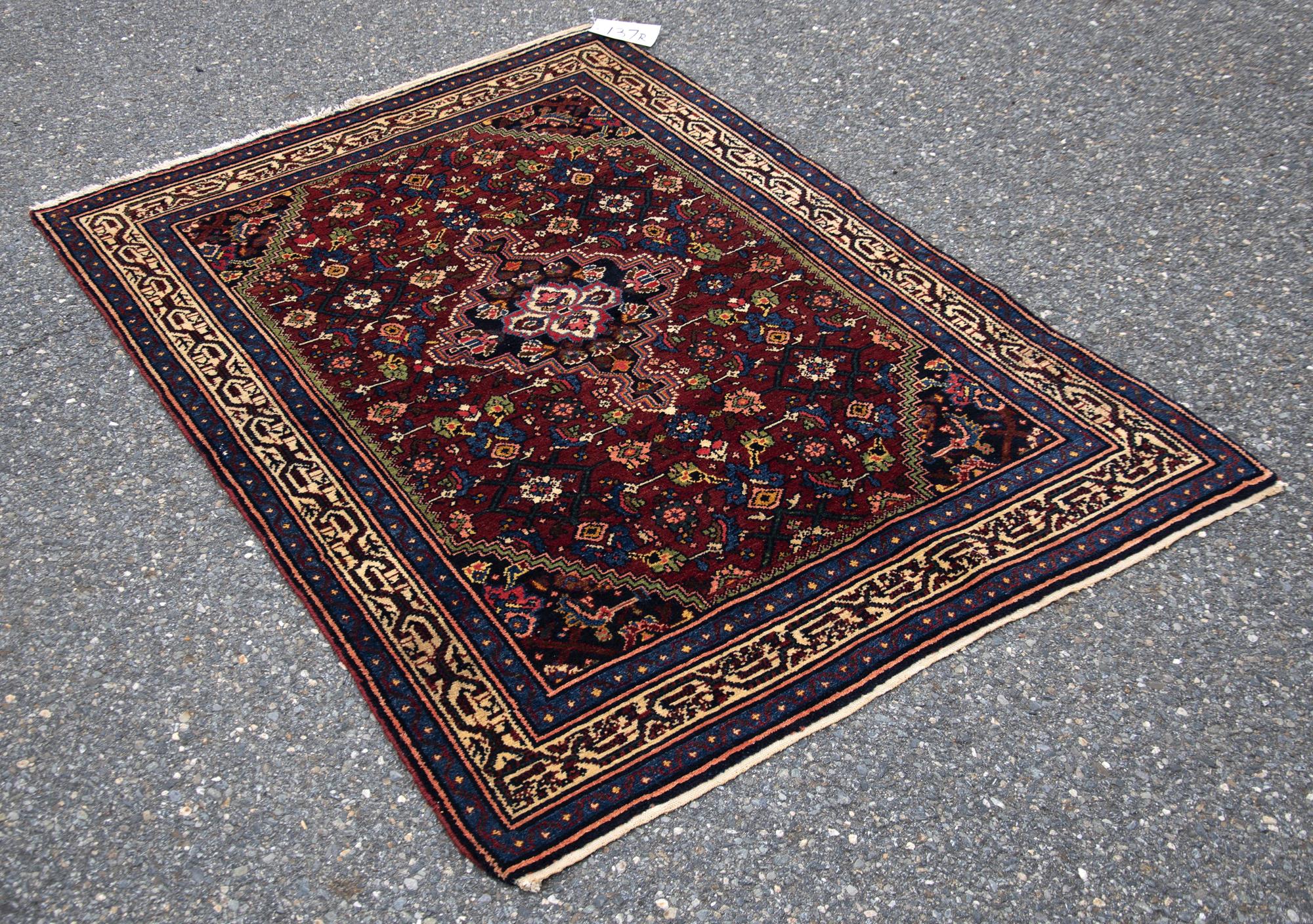 ANTIQUE ORIENTAL SCATTER RUG. Ca.