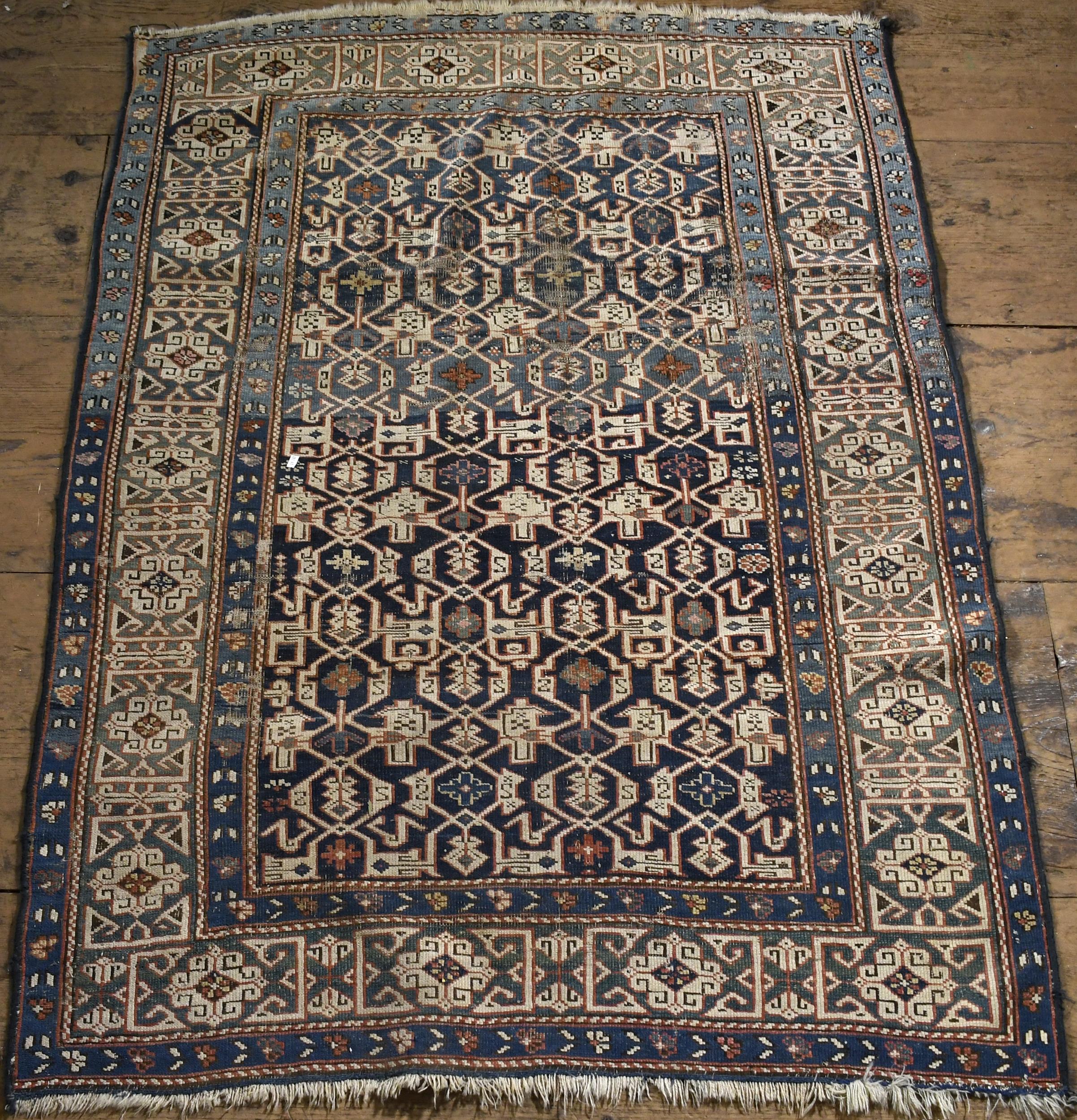ANTIQUE ORIENTAL SCATTER RUG.