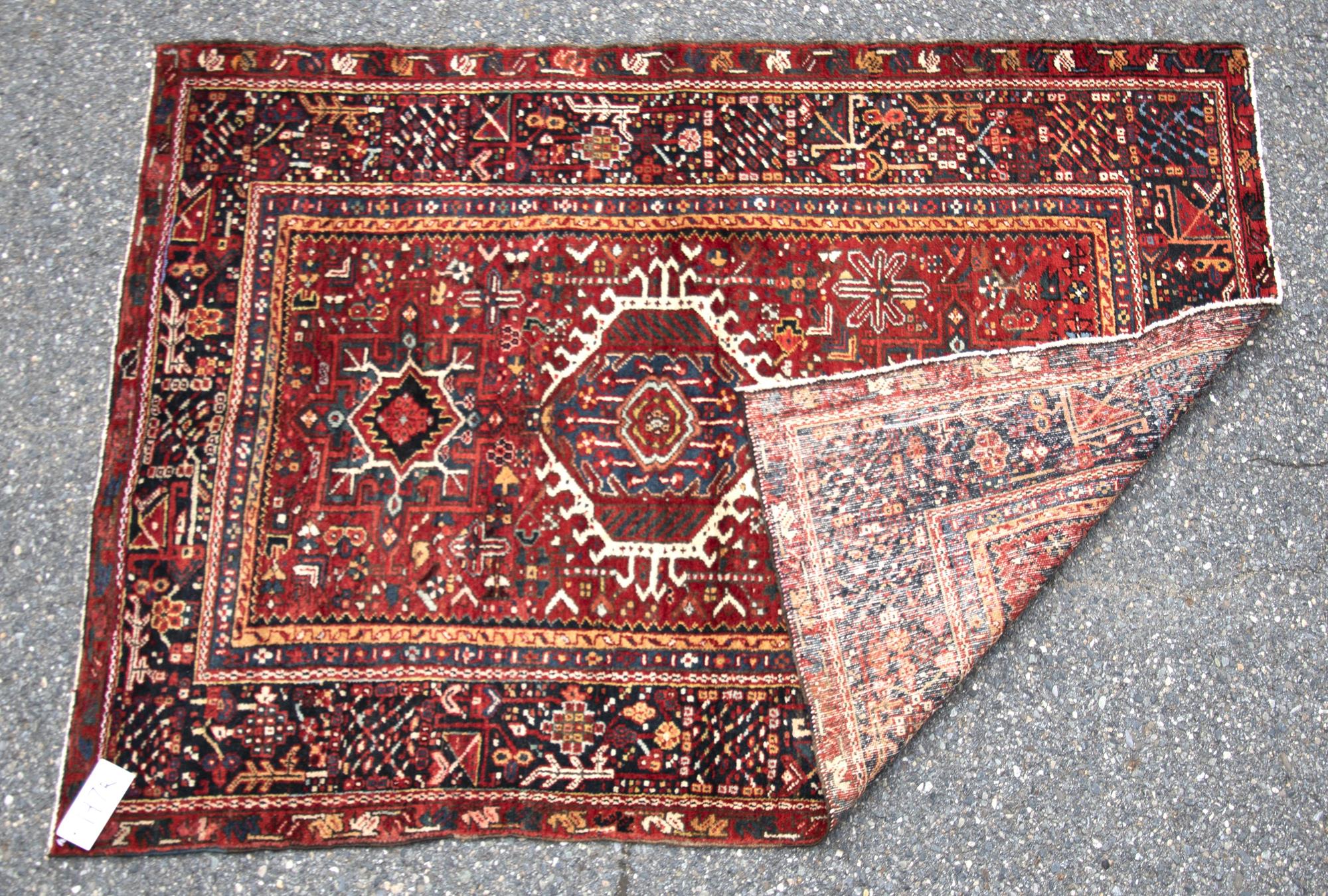 ANTIQUE ORIENTAL SCATTER RUG.