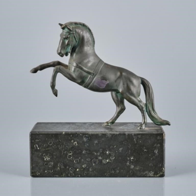 ANTIQUE PATINATED BRONZE OF A