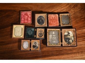 Antique photos in cases, including: