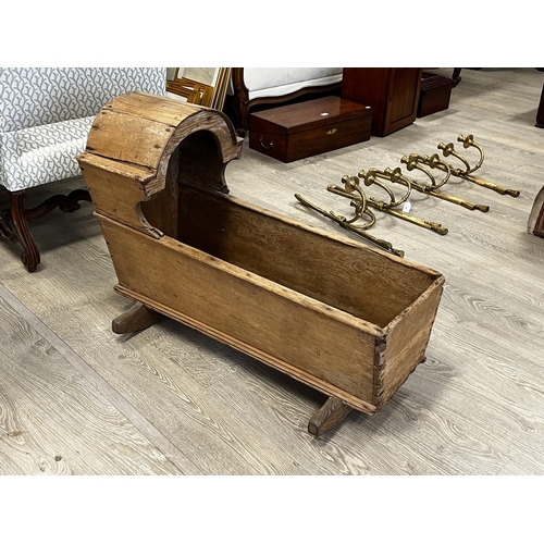 Antique pine infant cradle,