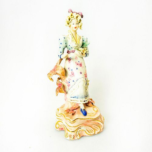 ANTIQUE PORCELAIN FIGURINE