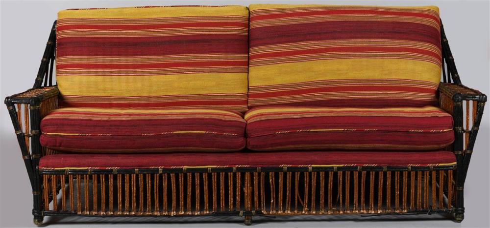 ANTIQUE RATTAN ARMCHAIR AND