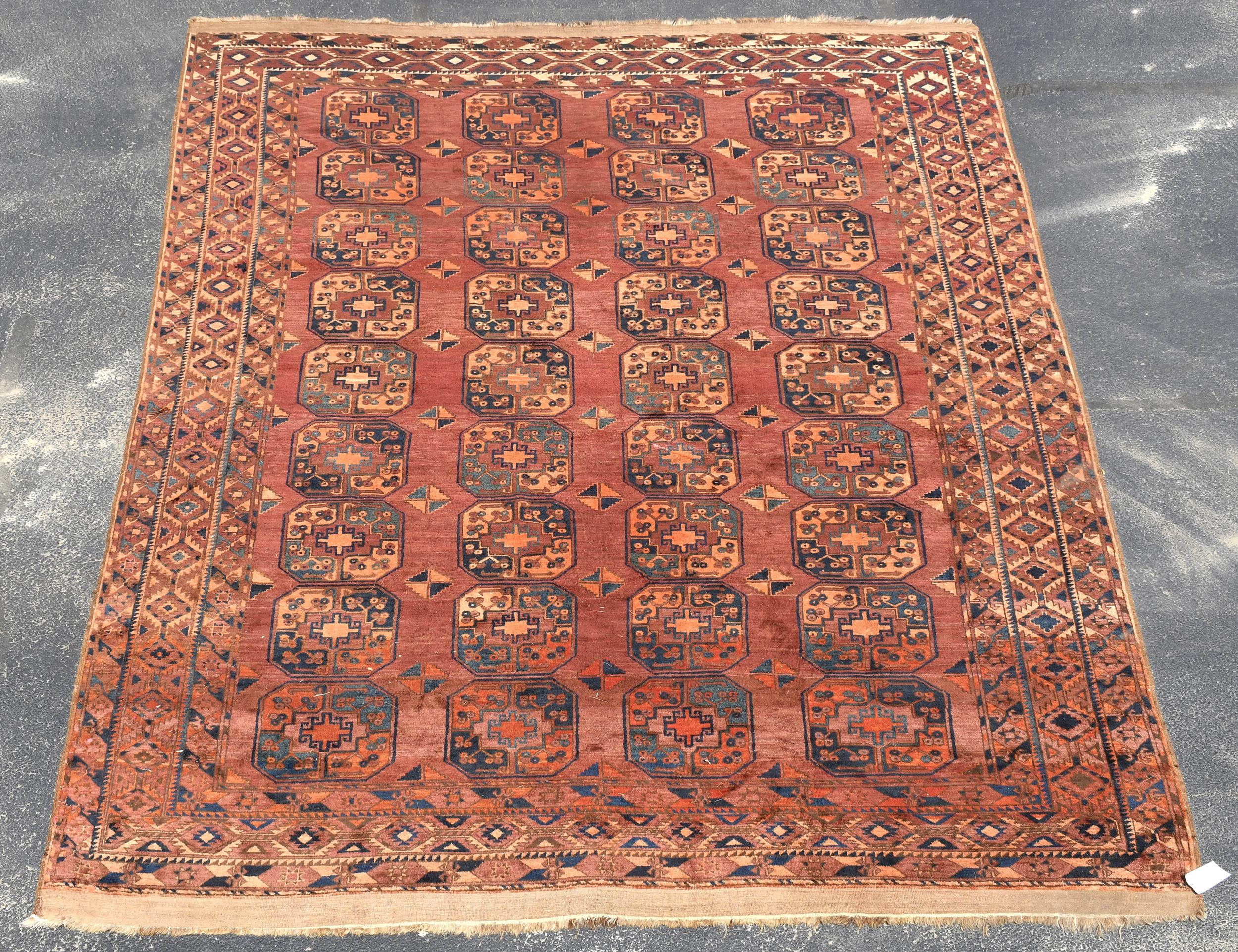 ANTIQUE ROOM SIZE BOKARA RUG.