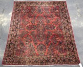 ANTIQUE ROOM SIZE SAROUK RUG.