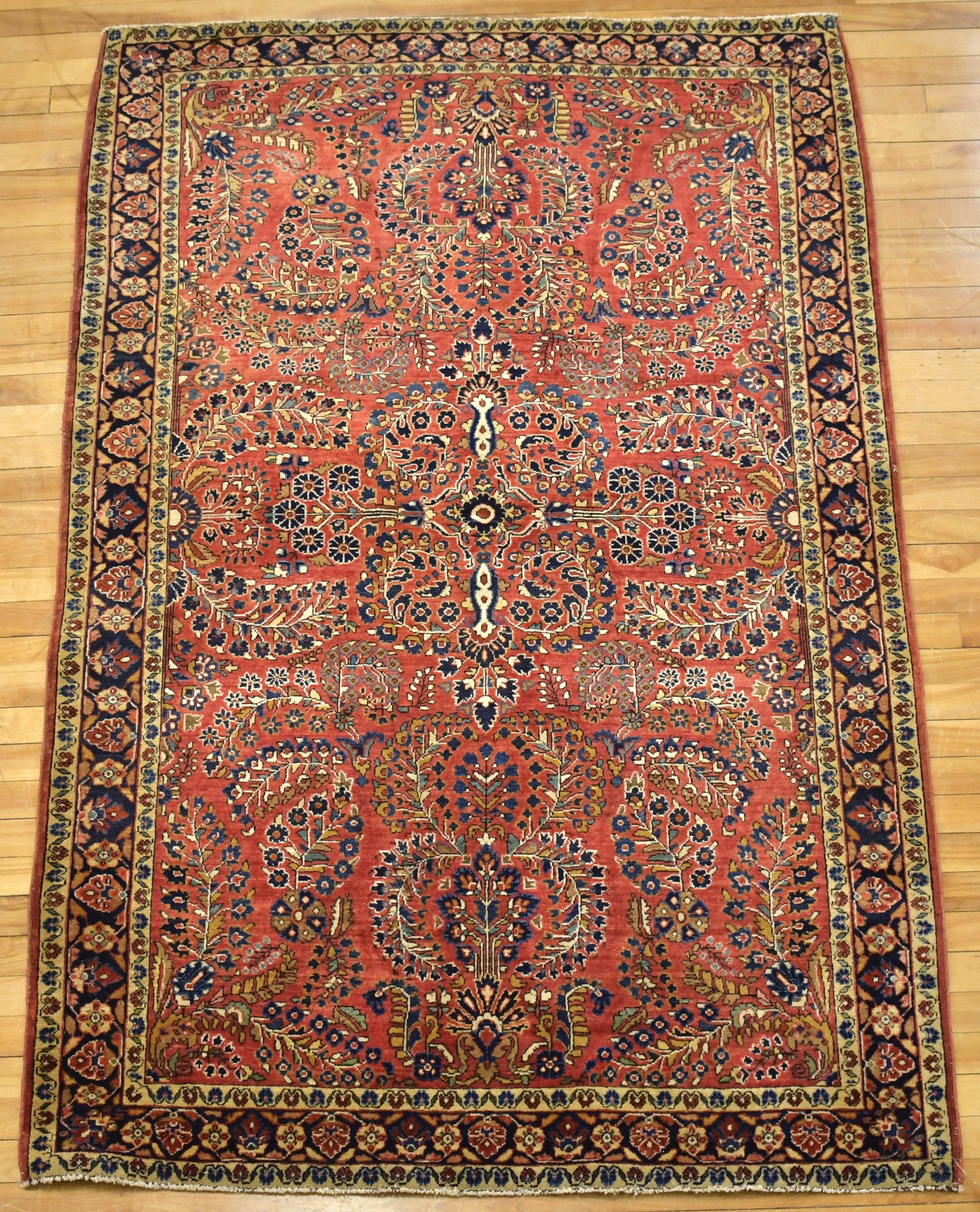 ANTIQUE SAROUK AREA RUG. An antique