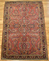 ANTIQUE SAROUK AREA RUG. An an