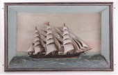 ANTIQUE SHADOWBOX OF A THREE-M
