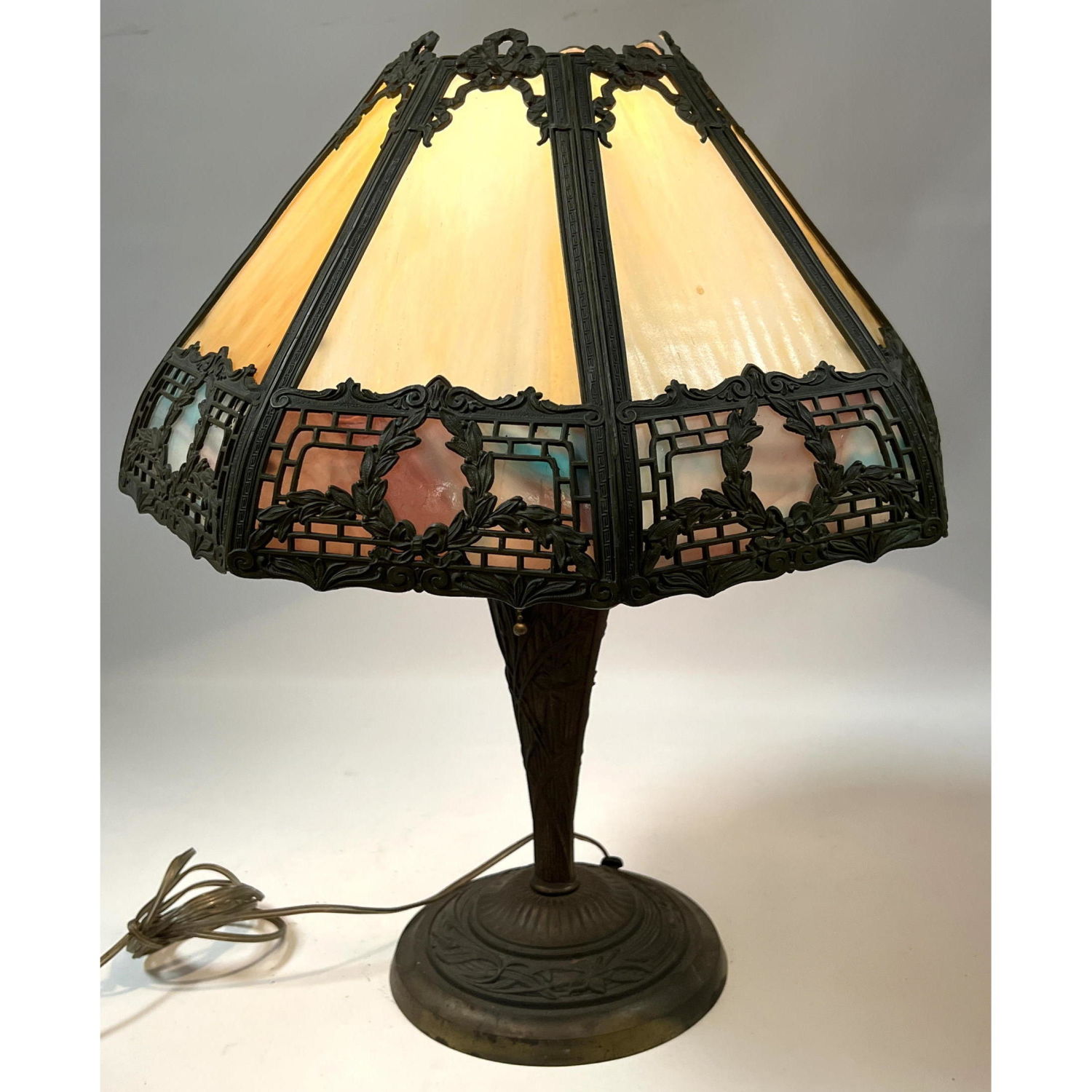 Antique slag glass lamp with wreath