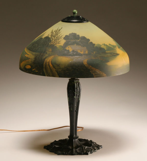 Antique table lamp with obverse and