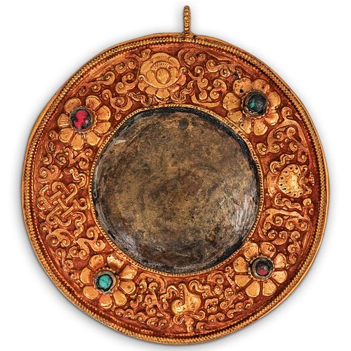 ANTIQUE TIBETAN REPOUSSE GILT