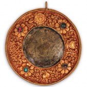 ANTIQUE TIBETAN REPOUSSE GILT