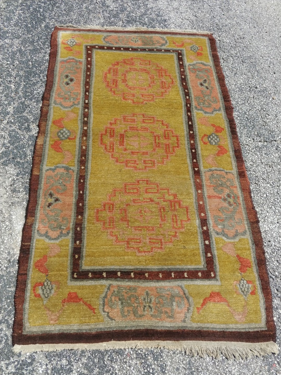 ANTIQUE TIBETAN RUG From a