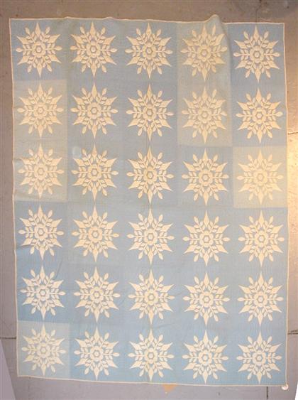 Appliqued quilt    made by emma