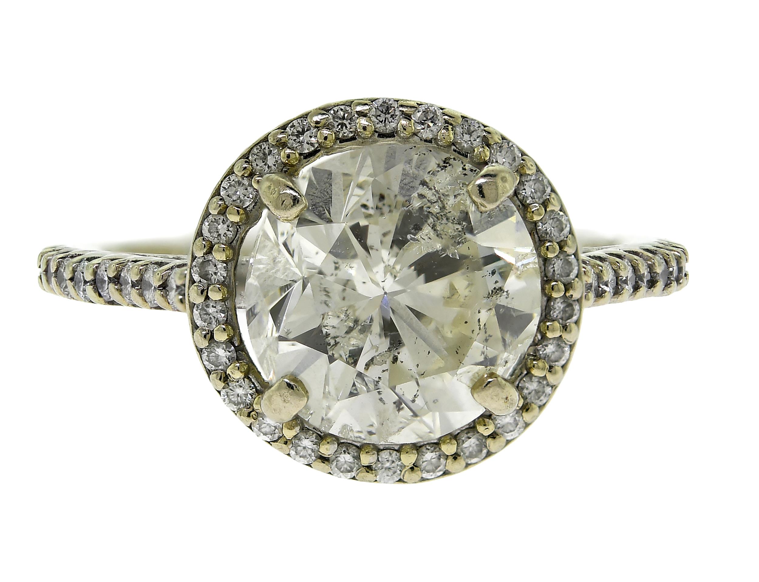 APPROX. 3 CT ROUND DIAMOND RING. An
