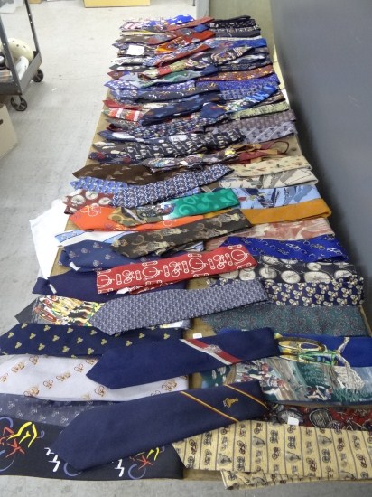 Approximately (80) ties with