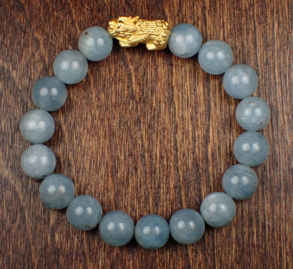 AQUAMARINE AND TWENTY-TWO KARAT