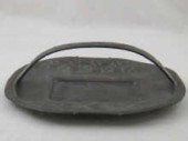 Archibald Knox. An oval pewter