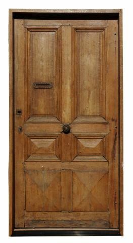 ARCHITECTURAL PANELED OAK DOOR WITH