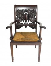 ARMCHAIR WITH ORNATE CARVED GR