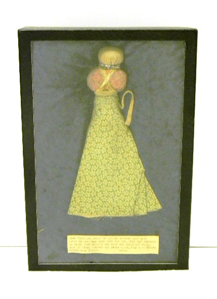 Armless cloth doll in European