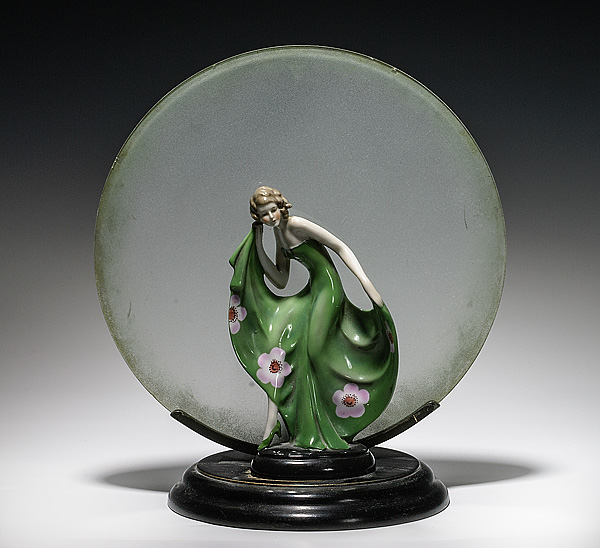 Art Deco Figure Backed by Glass