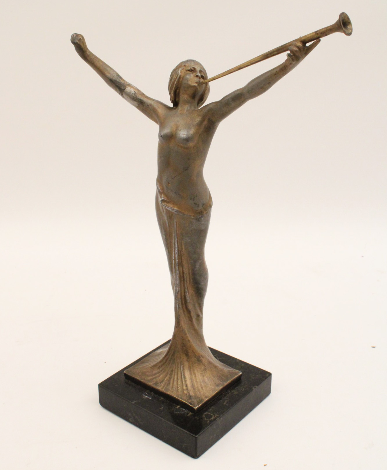 ART DECO FIGURE OF WOMAN BLOWING