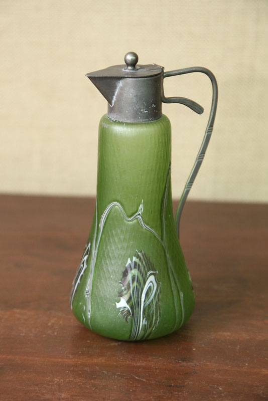 ART GLASS SYRUP PITCHER. Attributed