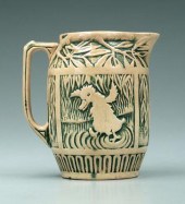 Art pottery pitcher with duckl