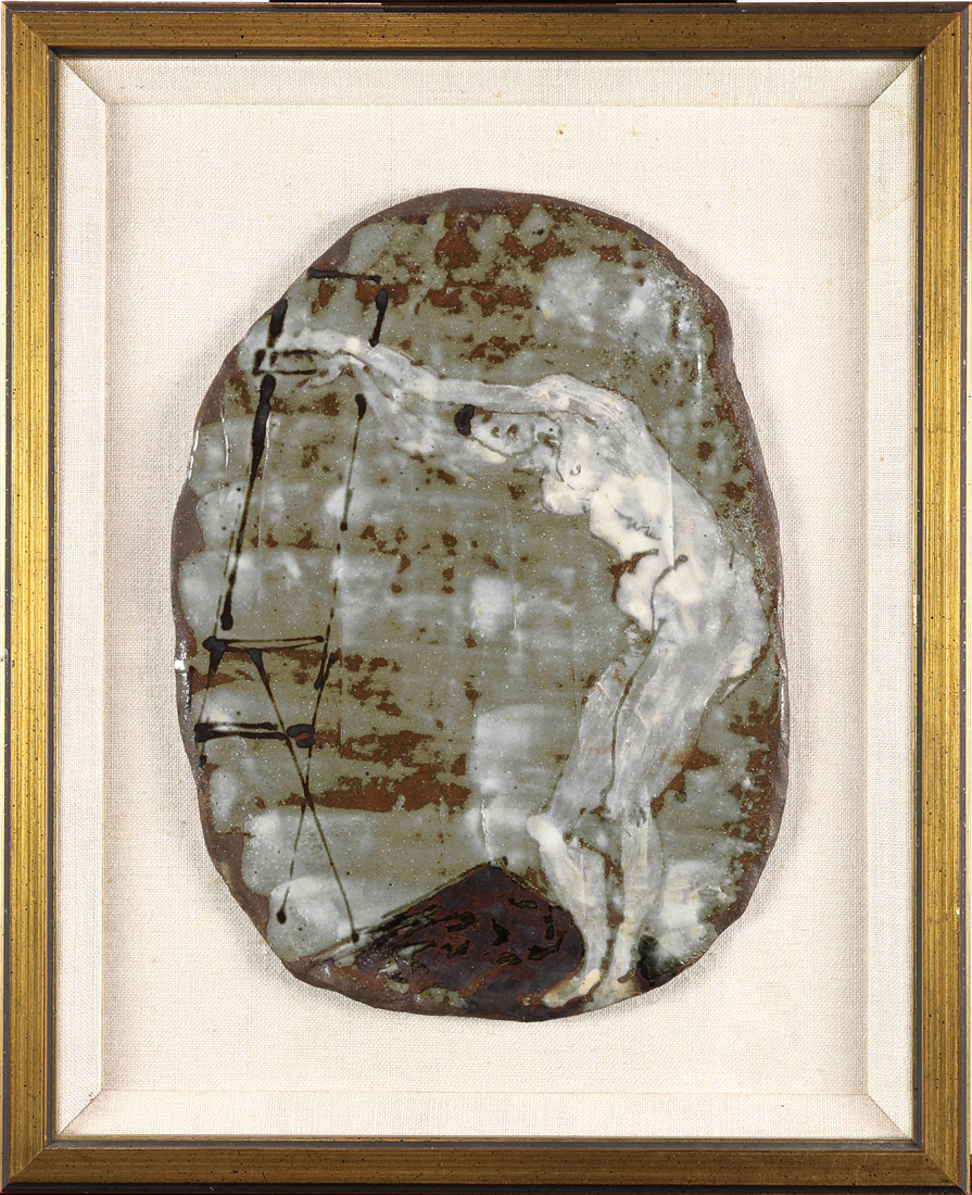 ART POTTERY PLAQUE OF A FEMALE NUDE