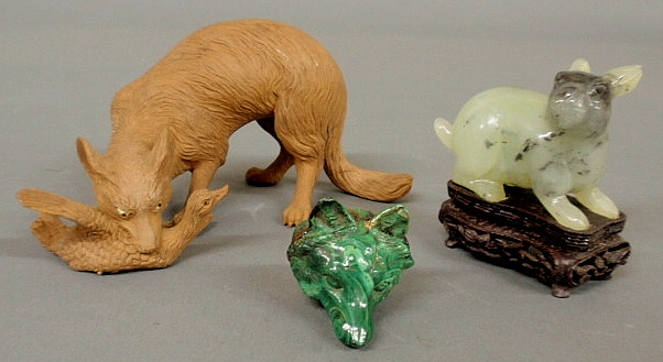 Asian carved wood fox with a duck