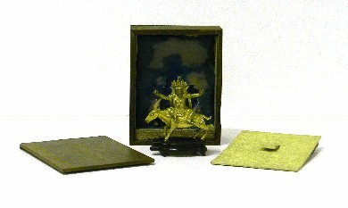 Asian deity on stag  gilt bronze 