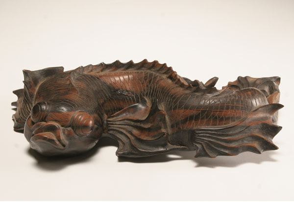Asian hand carved wooden koi