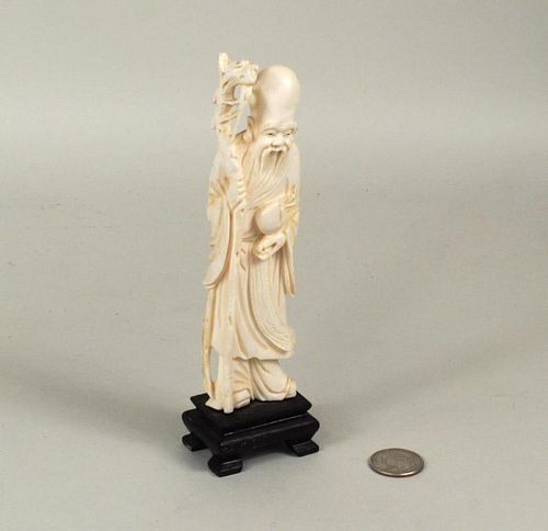ASIAN IVORY CARVING OF SAGE ON WOOD