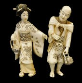 ASIAN: TWO CARVED STANDING IVO