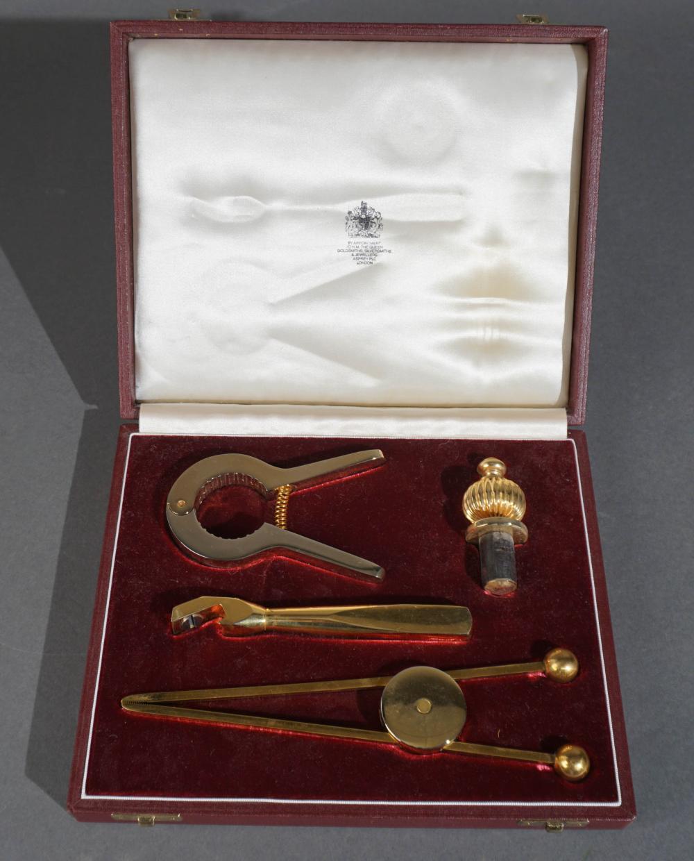 ASPREY BRASS PLATE WINE SET,