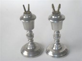 Assembled pair of pewter camph