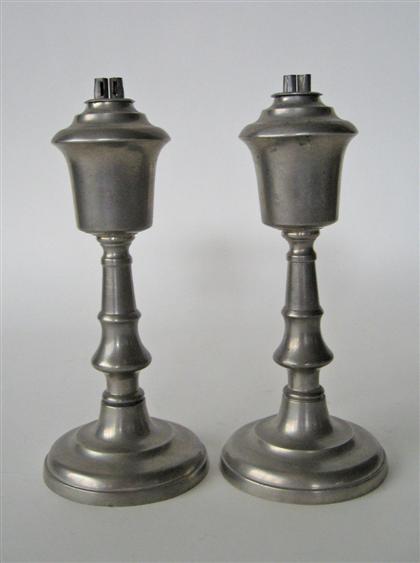 Assembled pair of pewter whale