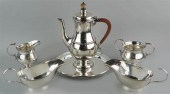 ASSEMBLED SILVER THREE-PIECE T