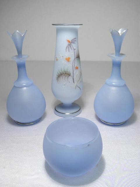 Assorted blue art glass vases and