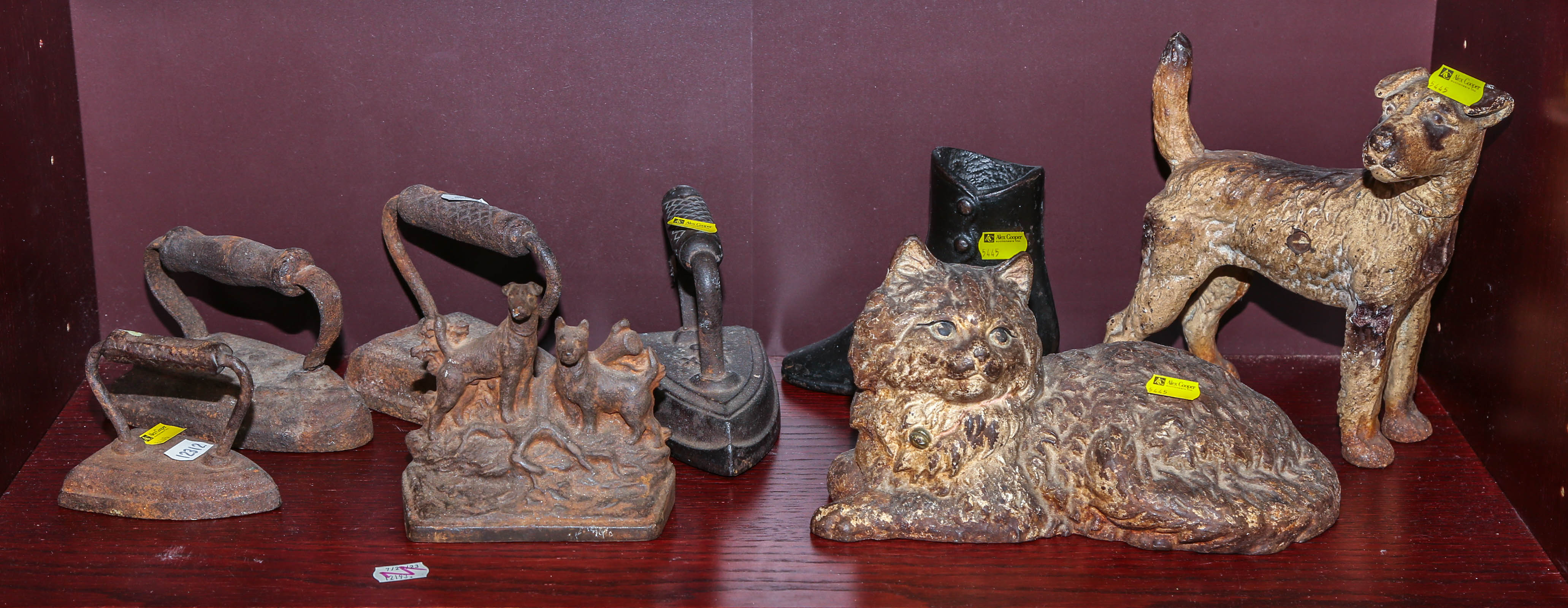ASSORTED CAST IRON DOOR STOPS &