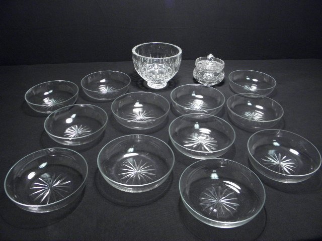 Assorted cut crystal items.