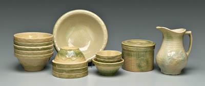Assorted green-glazed crockery: