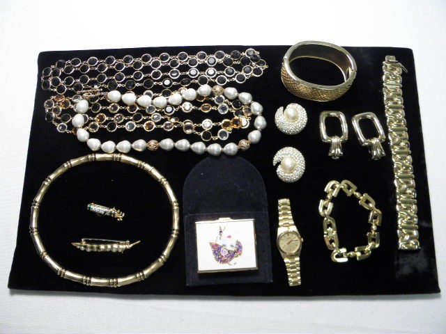 Assorted ladies costume jewelry.