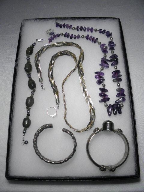 Assorted sterling silver jewelry.