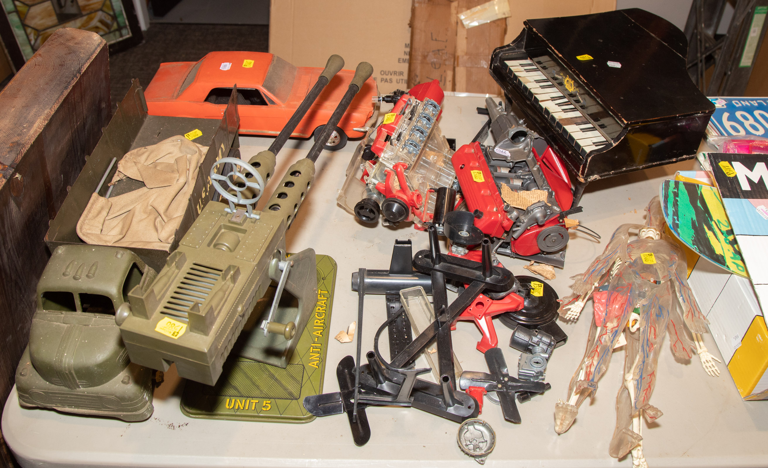 ASSORTED TOYS Includes model,