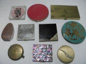 Assorted vintage powder compac