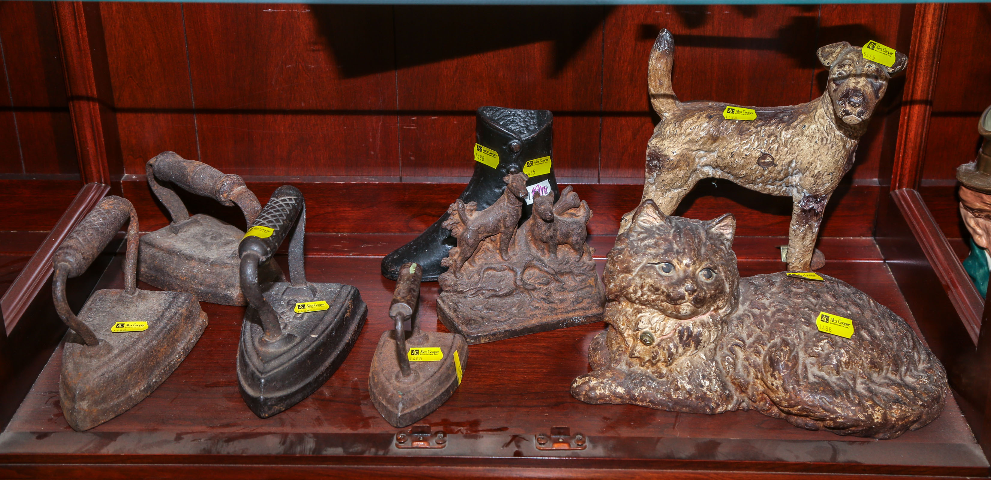 ASSORTMENT OF CAST IRON DOORSTOPS &