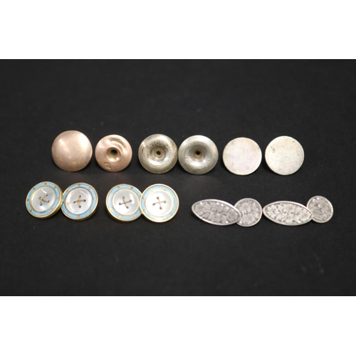 Assortment of cufflinks and